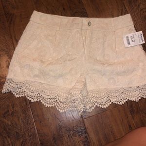 White lace shorts